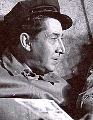 Photo taken in 1948 of Estaño sitting with Siqueiros 